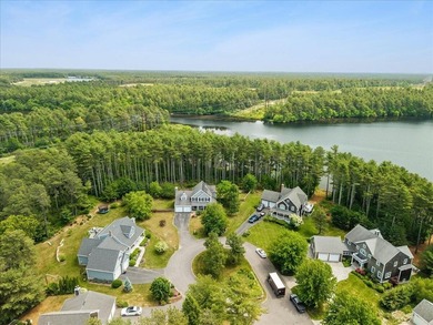 Overlooking Tihonet Pond, 22 Red Pine Lane offers a distinctive - photo 12