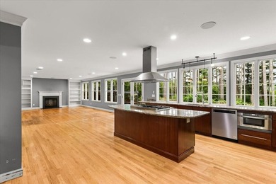 Overlooking Tihonet Pond, 22 Red Pine Lane offers a distinctive - photo 18