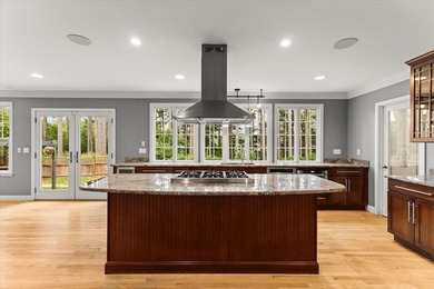 Overlooking Tihonet Pond, 22 Red Pine Lane offers a distinctive - photo 19