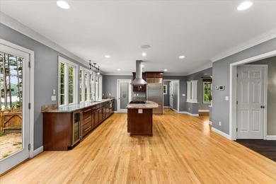 Overlooking Tihonet Pond, 22 Red Pine Lane offers a distinctive - photo 22