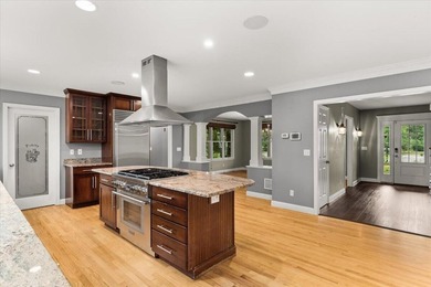 Overlooking Tihonet Pond, 22 Red Pine Lane offers a distinctive - photo 24