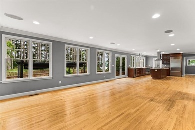 Overlooking Tihonet Pond, 22 Red Pine Lane offers a distinctive - photo 28