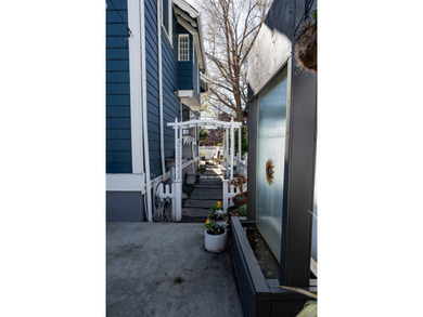 Crisp white architectural accents, blue paint & a white fence - photo 32