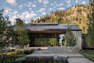 River Lodge, a new riverfront estate set on 2.1 acres along the - photo 4