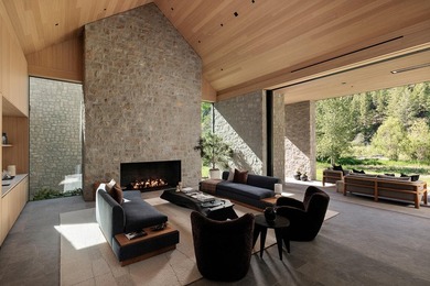 River Lodge, a new riverfront estate set on 2.1 acres along the - photo 9