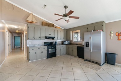 This amazing bay front home gives the feeling of being out in - photo 11