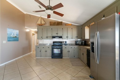 This amazing bay front home gives the feeling of being out in - photo 12