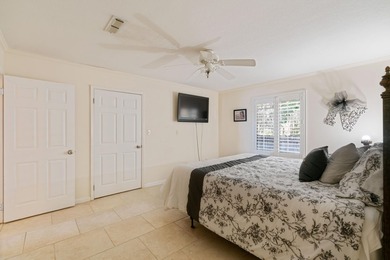 This amazing bay front home gives the feeling of being out in - photo 17