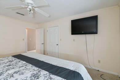 This amazing bay front home gives the feeling of being out in - photo 18