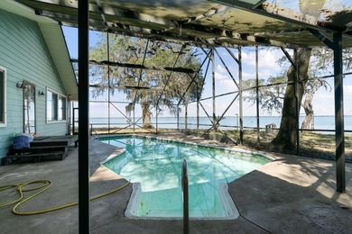 This amazing bay front home gives the feeling of being out in - photo 29