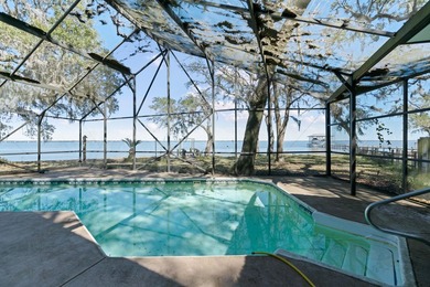 This amazing bay front home gives the feeling of being out in - photo 30