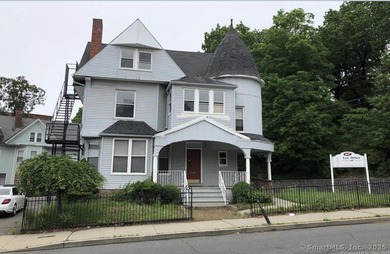 Renovated mixed-use investment with 3 units. 1st floor 1350 sqft