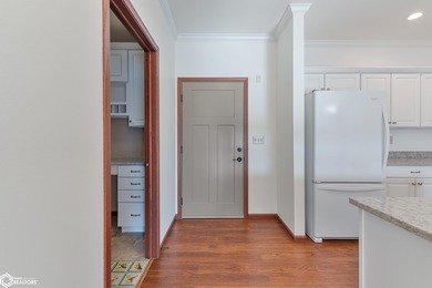 Welcome to this beautifully appointed main-level condo in Garden