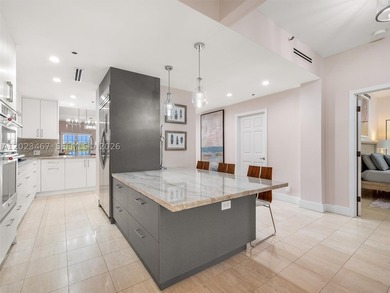 Live the Fisher Island lifestyle in this renovated Bayside - photo 11