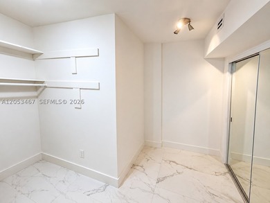 Beautifully remodeled 2-bedroom + den, 2-bath residence has the - photo 11