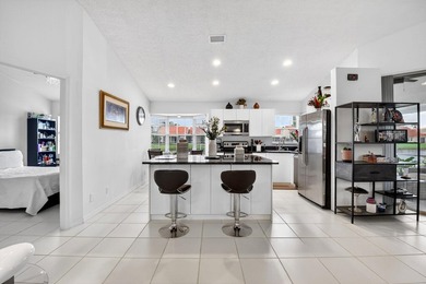 Welcome to a beautifully reimagined lakefront Turnkey home. This - photo 11
