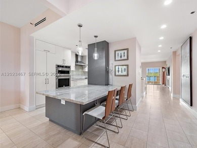 Live the Fisher Island lifestyle in this renovated Bayside - photo 12