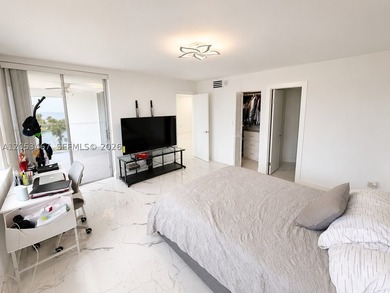 Beautifully remodeled 2-bedroom + den, 2-bath residence has the - photo 13