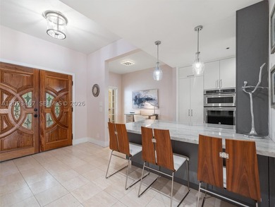Live the Fisher Island lifestyle in this renovated Bayside - photo 15
