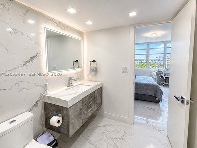 Beautifully remodeled 2-bedroom + den, 2-bath residence has the - photo 16