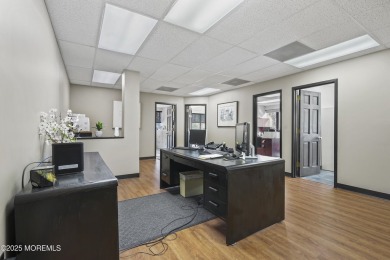 Beautifully updated second-floor, corner commercial condo in one