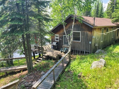 Rainy Lake. Amazingly charming 2 bedroom Keyes Island cabin on - photo 27