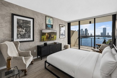 Direct open bay and city views set the stage for this modern - photo 22