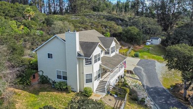 Welcome to a beautiful, private hilltop home in Prunedale. The - photo 2