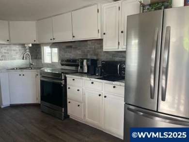 Check out this well-appointed space with 2 bedrooms + office!