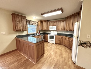 This bright second-floor condo offers comfortable living with