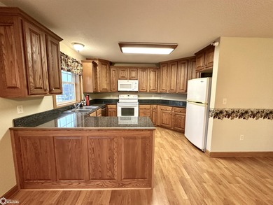 This bright second-floor condo offers comfortable living with