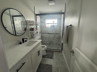 Welcome to this stunningly updated 2-bedroom, 1-bath villa! - photo 11