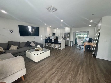 Welcome to this stunningly updated 2-bedroom, 1-bath villa! - photo 12