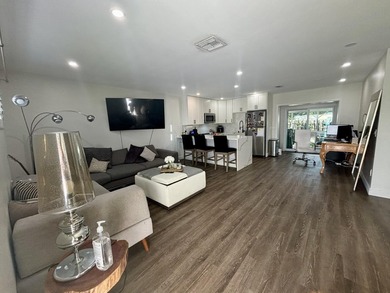 Welcome to this stunningly updated 2-bedroom, 1-bath villa! - photo 13