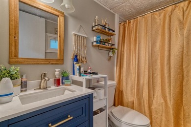 Updated, well-maintained 2-bed 1-bath mobile lakefront home on - photo 12