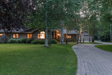 This charming home is a jewel on a mature one-acre lot. The - photo 2