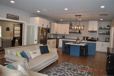 LOCATED IN THE HEART OF LONGTOWN, this like-new barndominium - photo 17