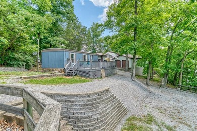 Updated, well-maintained 2-bed 1-bath mobile lakefront home on - photo 18