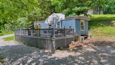 Updated, well-maintained 2-bed 1-bath mobile lakefront home on - photo 21