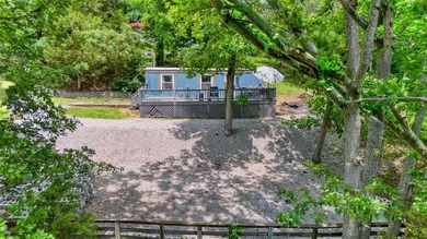 Updated, well-maintained 2-bed 1-bath mobile lakefront home on - photo 22
