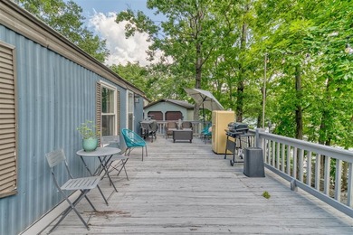 Updated, well-maintained 2-bed 1-bath mobile lakefront home on - photo 23