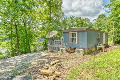 Updated, well-maintained 2-bed 1-bath mobile lakefront home on - photo 25