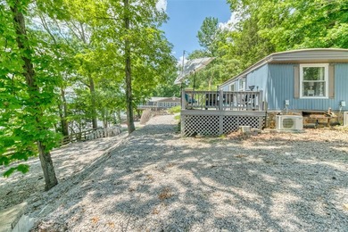 Updated, well-maintained 2-bed 1-bath mobile lakefront home on - photo 26