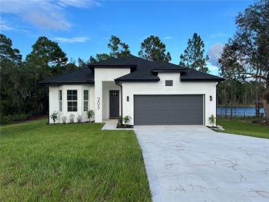 Lake Home For Sale in Deltona, Florida