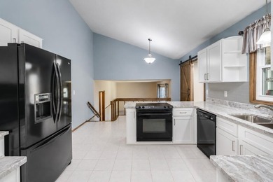 LAKE ACCESS! Spacious 4-bedroom, 2.5-bath quad-level home in - photo 8