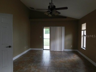 Nice 3/2 with formal living room with sliders leading to back - photo 13