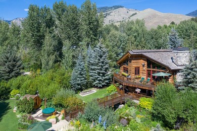 Tucked along a half-acre parcel bordering the Bigwood River - photo 2