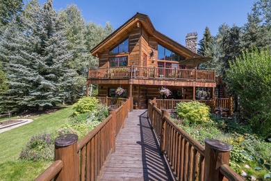 Tucked along a half-acre parcel bordering the Bigwood River - photo 3
