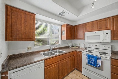 Nestled within the gated Sienna Condominiums in Scottsdale, just - photo 7