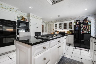 This gated estate offers a lavish, resort-style atmosphere where - photo 23